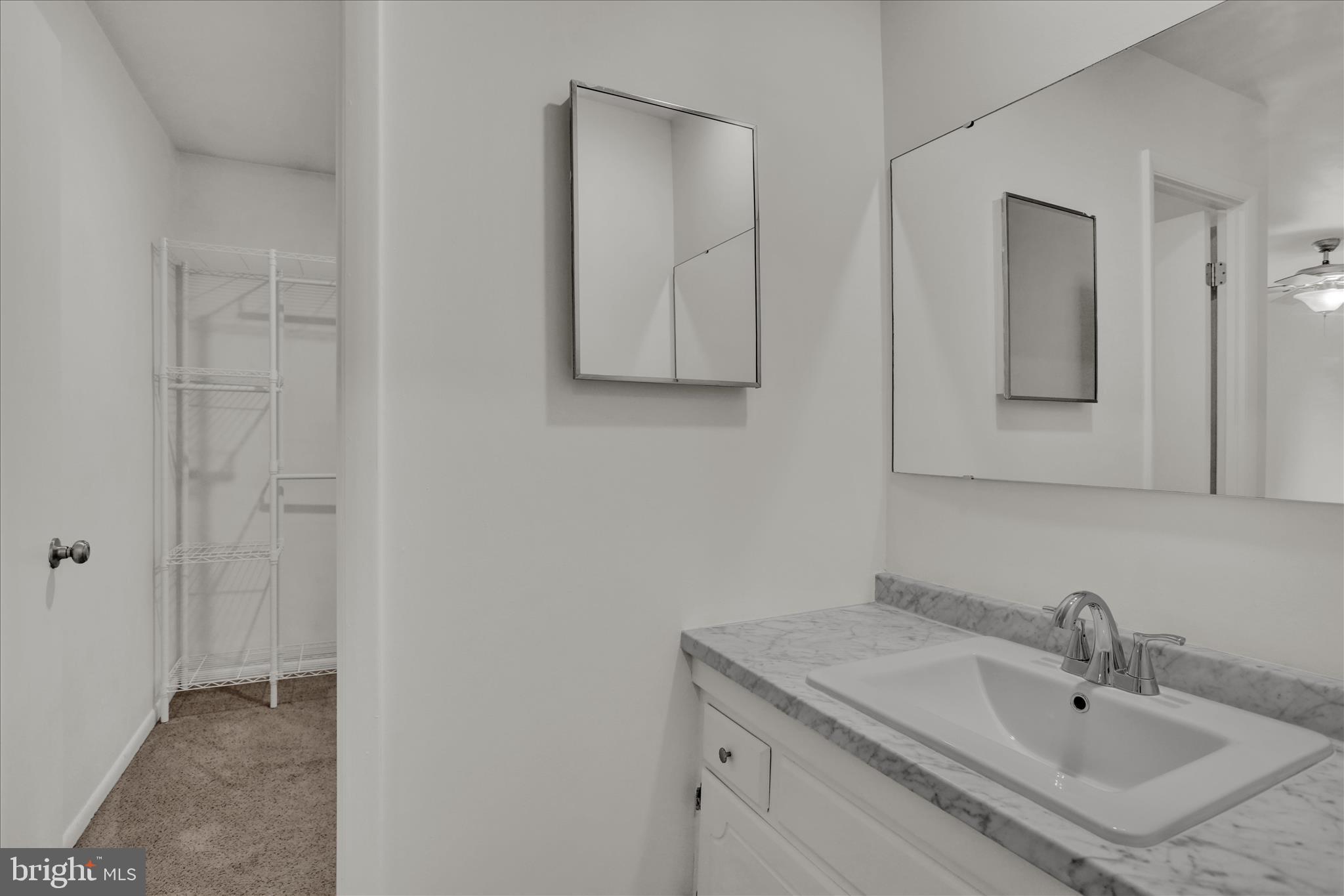 3 Willow Way Reading, PA 19606 - Photo 21 of 32 a bathroom with a sink and a mirror