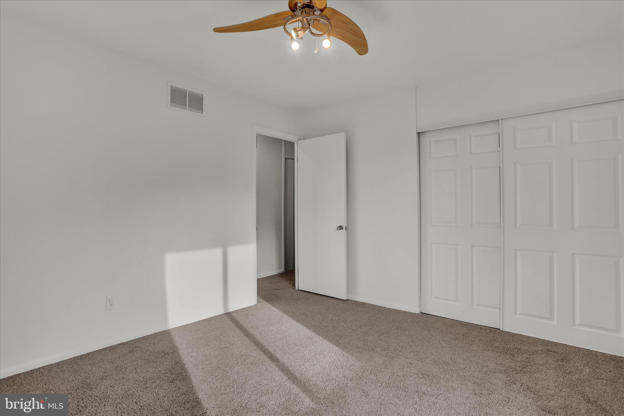 3 Willow Way Reading, PA 19606 - Photo 24 of 32 a view of an empty room with a chandelier fan