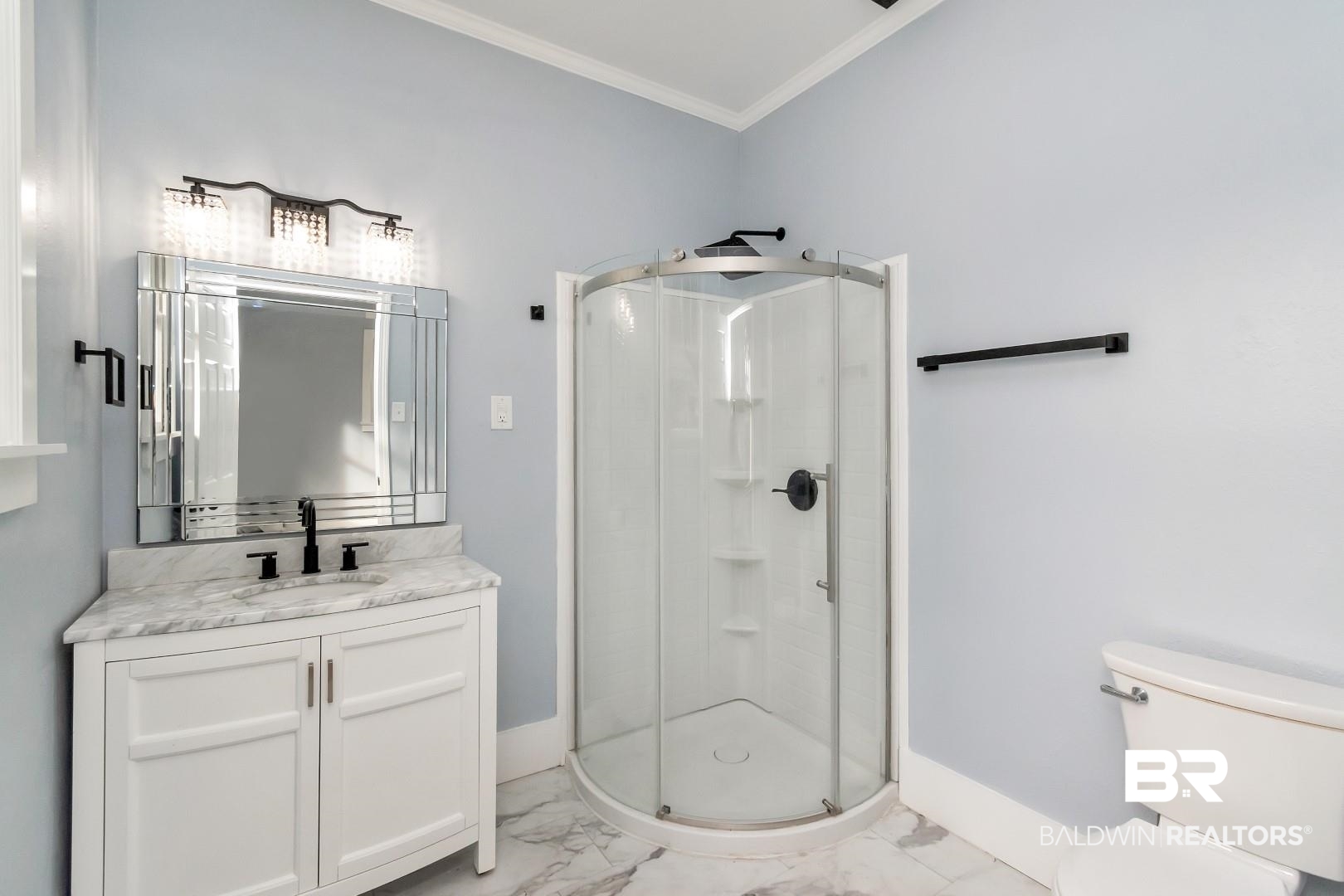 555 Michigan Avenue Mobile, AL 36604 - Photo 19 of 28 Bathroom with toilet, vanity, crown molding, and a shower with shower door