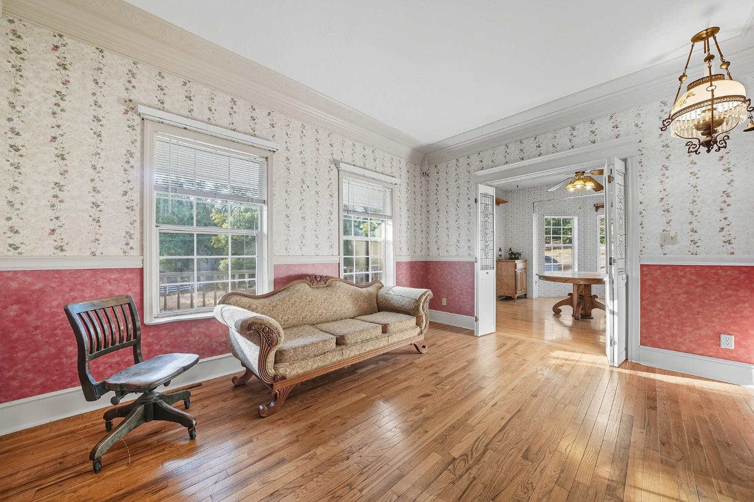 12810 New York Ranch Road Jackson, CA 95642 - Photo 20 of 56 a living room with furniture and wooden floor