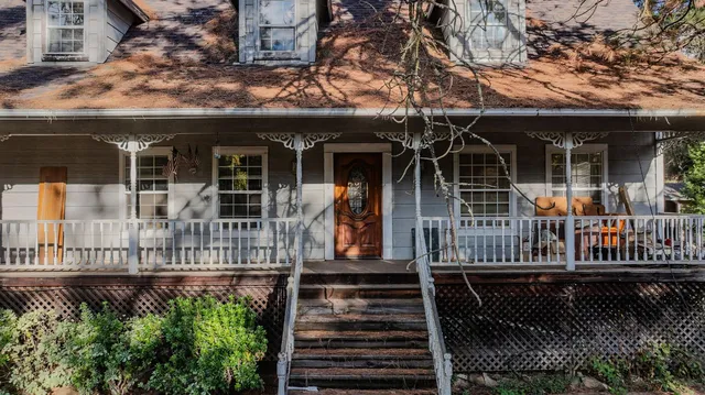 front view of a house with a small yard