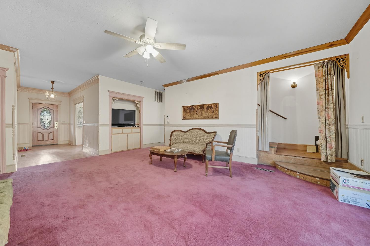 12810 New York Ranch Road Jackson, CA 95642 - Photo 26 of 56 a living room with furniture and a flat screen tv