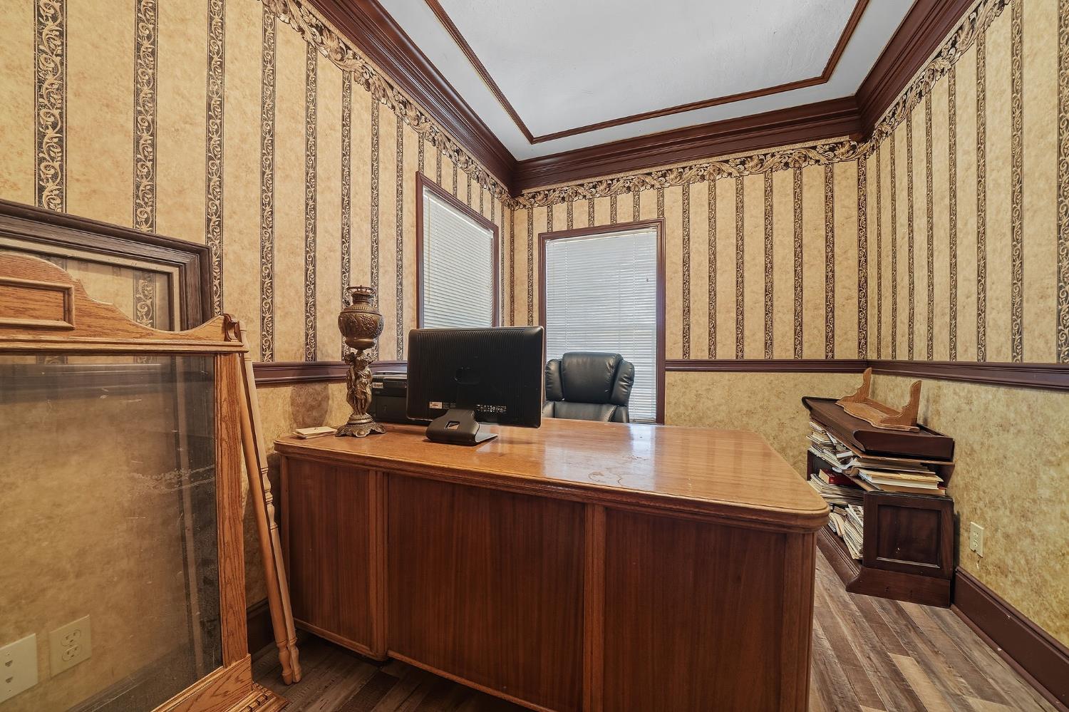 12810 New York Ranch Road Jackson, CA 95642 - Photo 33 of 56 a view of a workspace with furniture and a window