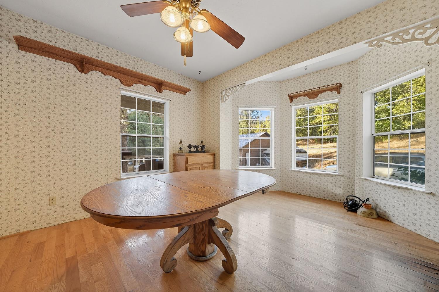 12810 New York Ranch Road Jackson, CA 95642 - Photo 40 of 56 a view of a room with furniture window and wooden floor