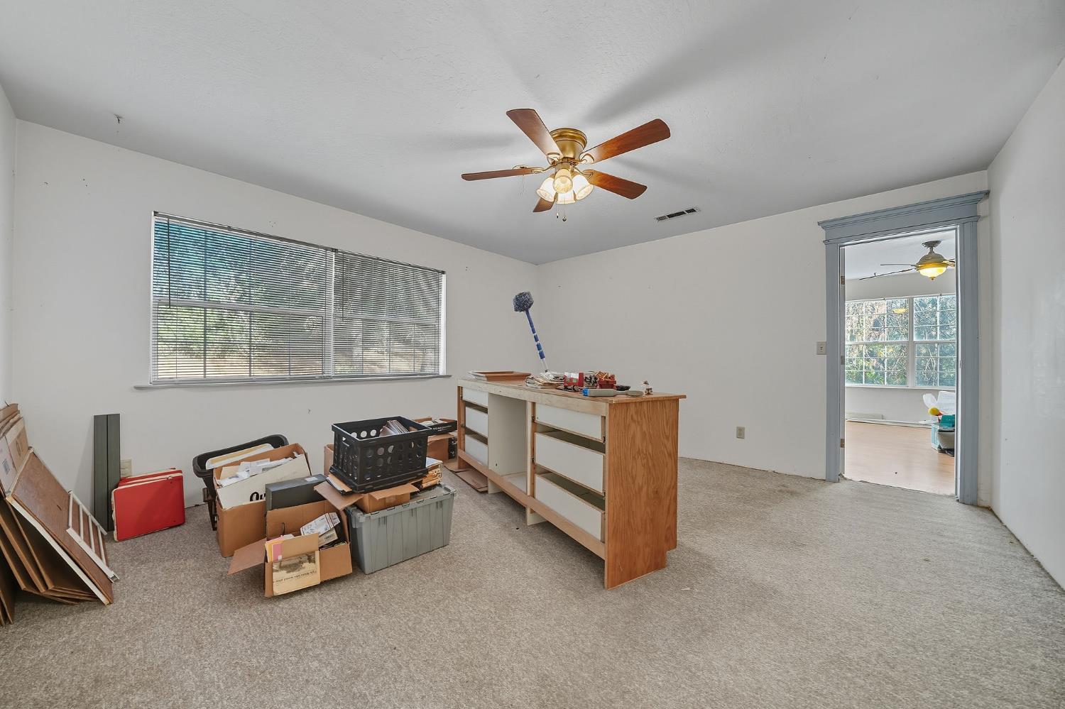 12810 New York Ranch Road Jackson, CA 95642 - Photo 51 of 56 a living room with furniture and a window