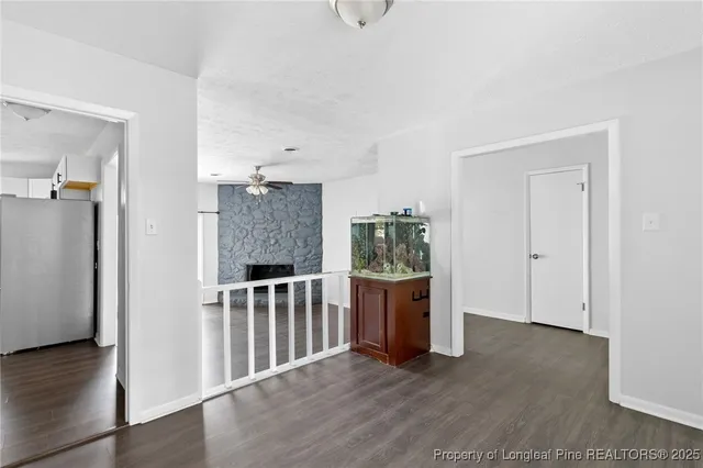 an entryway at livingroom with furniture and wooden floor