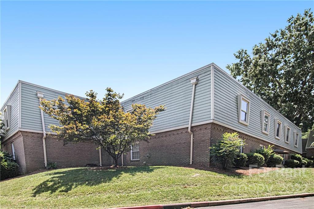 2624 Park Road, Unit E Charlotte, NC 28209 - Photo 26 of 26 a view of a house with a yard
