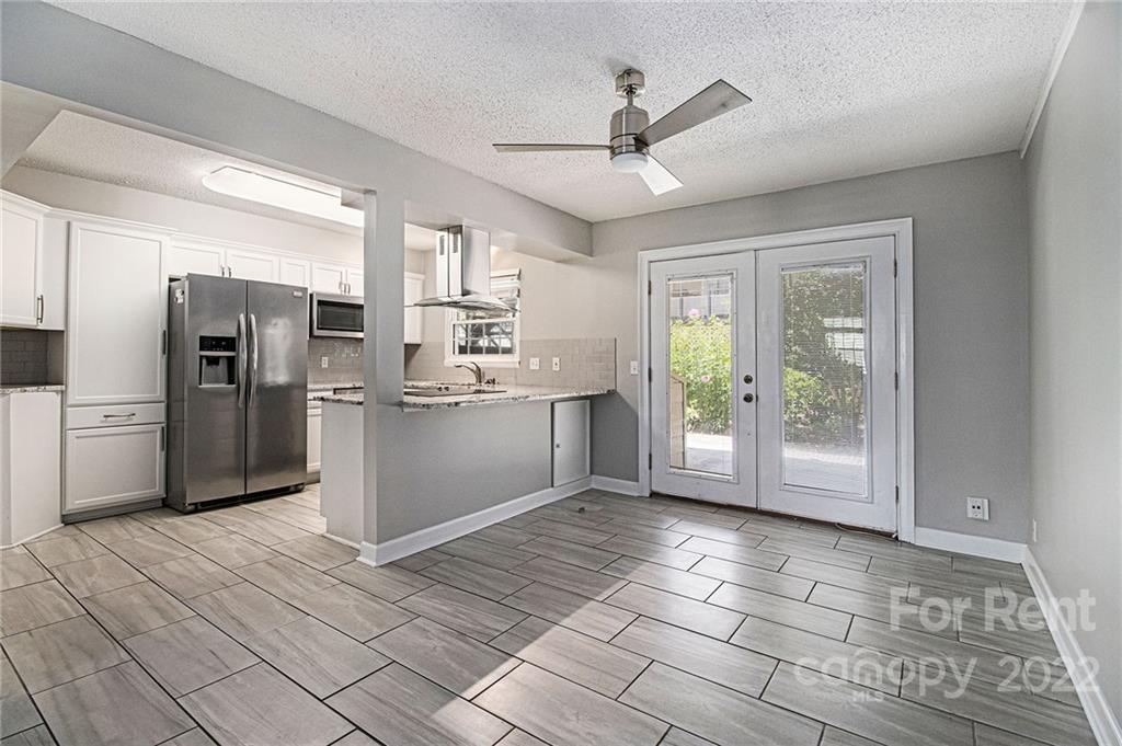 2624 Park Road, Unit E Charlotte, NC 28209 - Photo 5 of 26 a view interior of the kitchen and windows