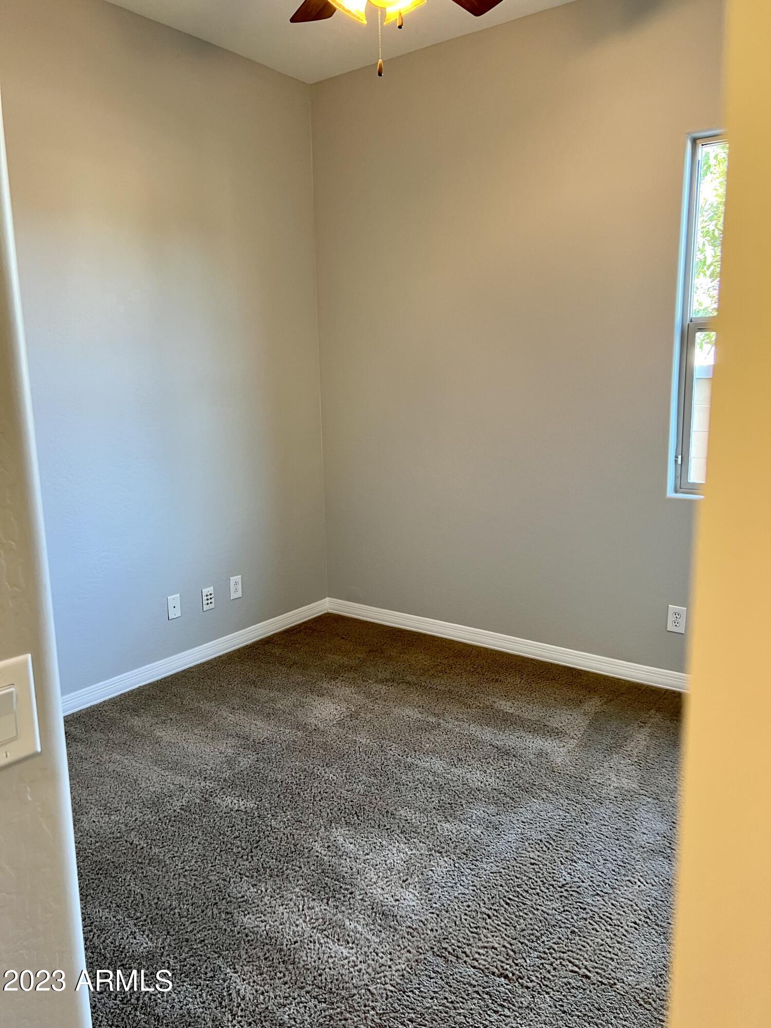 20296 East Sonoqui Boulevard Queen Creek, AZ 85142 - Photo 12 of 22 a view of an empty room