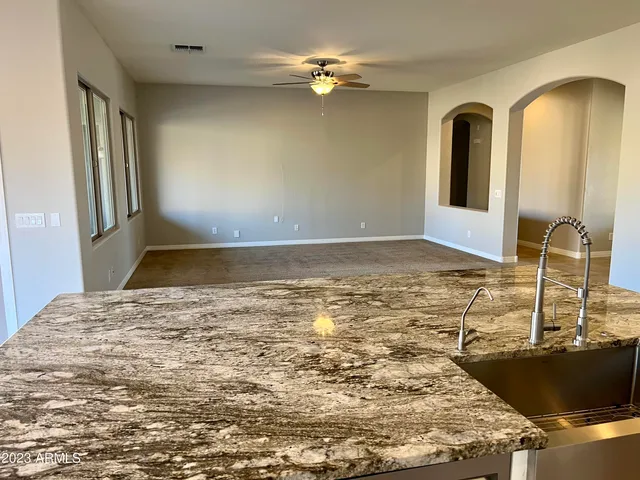 a view of a bedroom with a sink