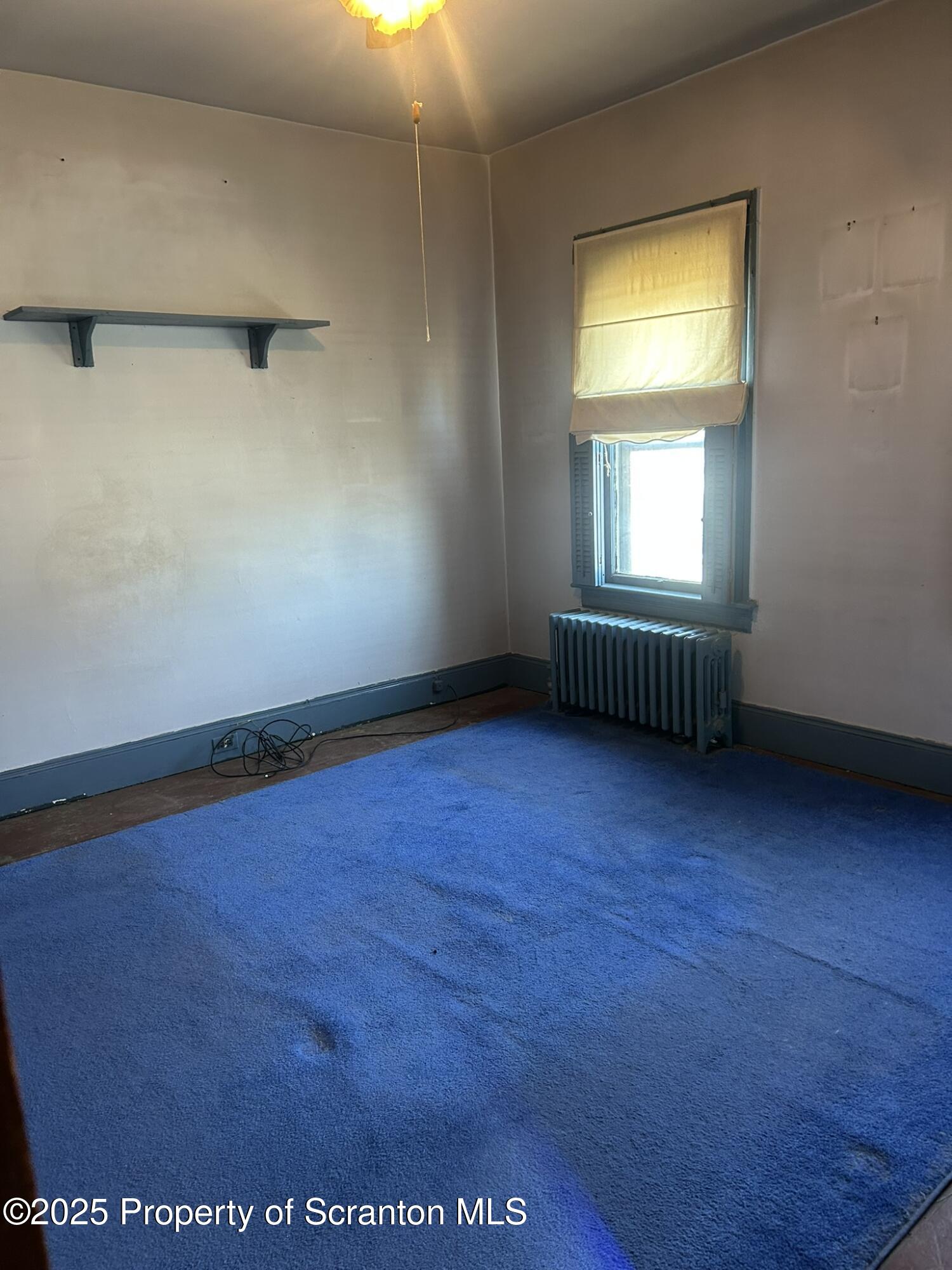 626 Cherry Street Scranton, PA 18505 - Photo 12 of 20 an empty room with a window