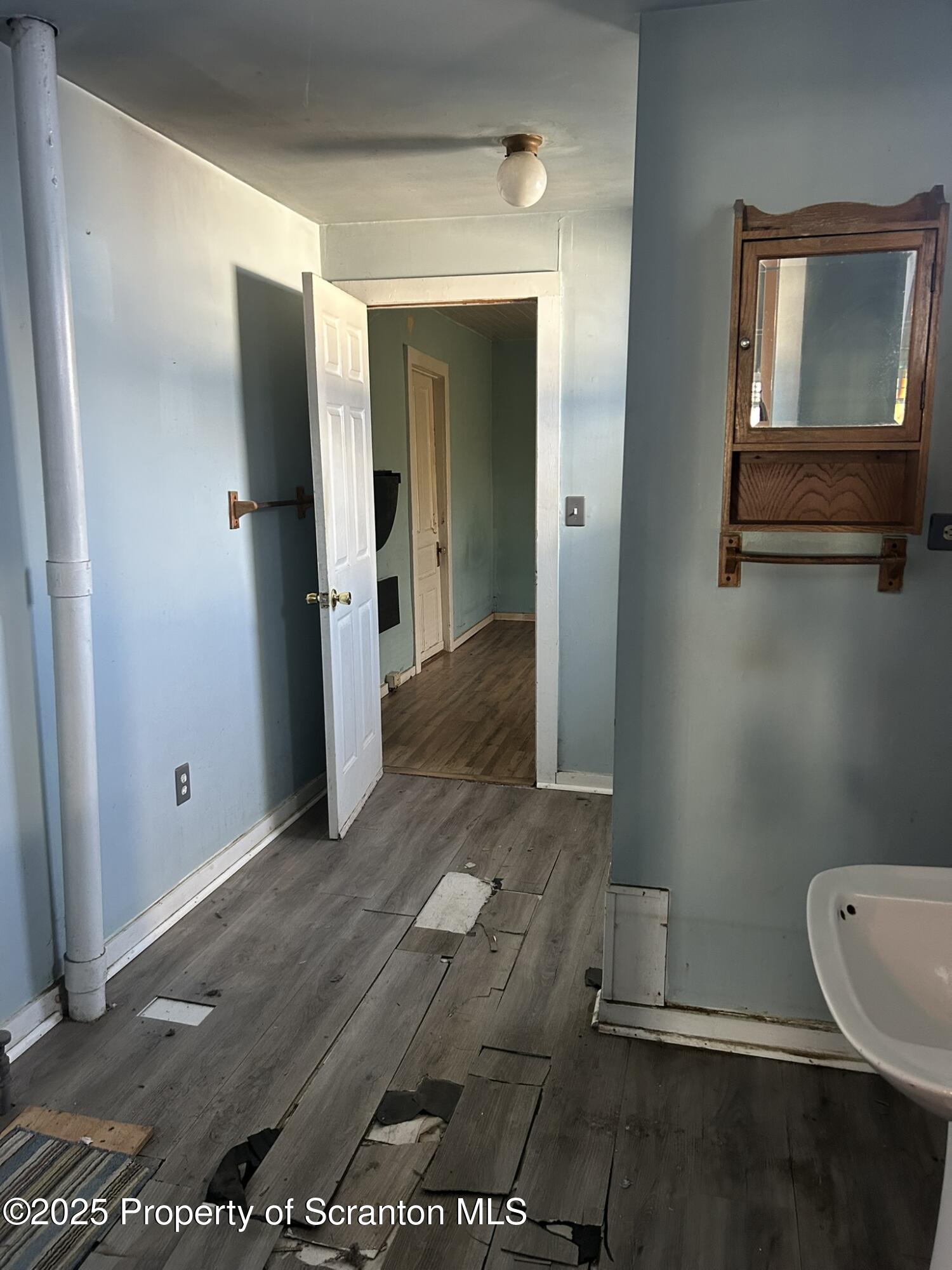626 Cherry Street Scranton, PA 18505 - Photo 16 of 20 a view of a bathroom with sink
