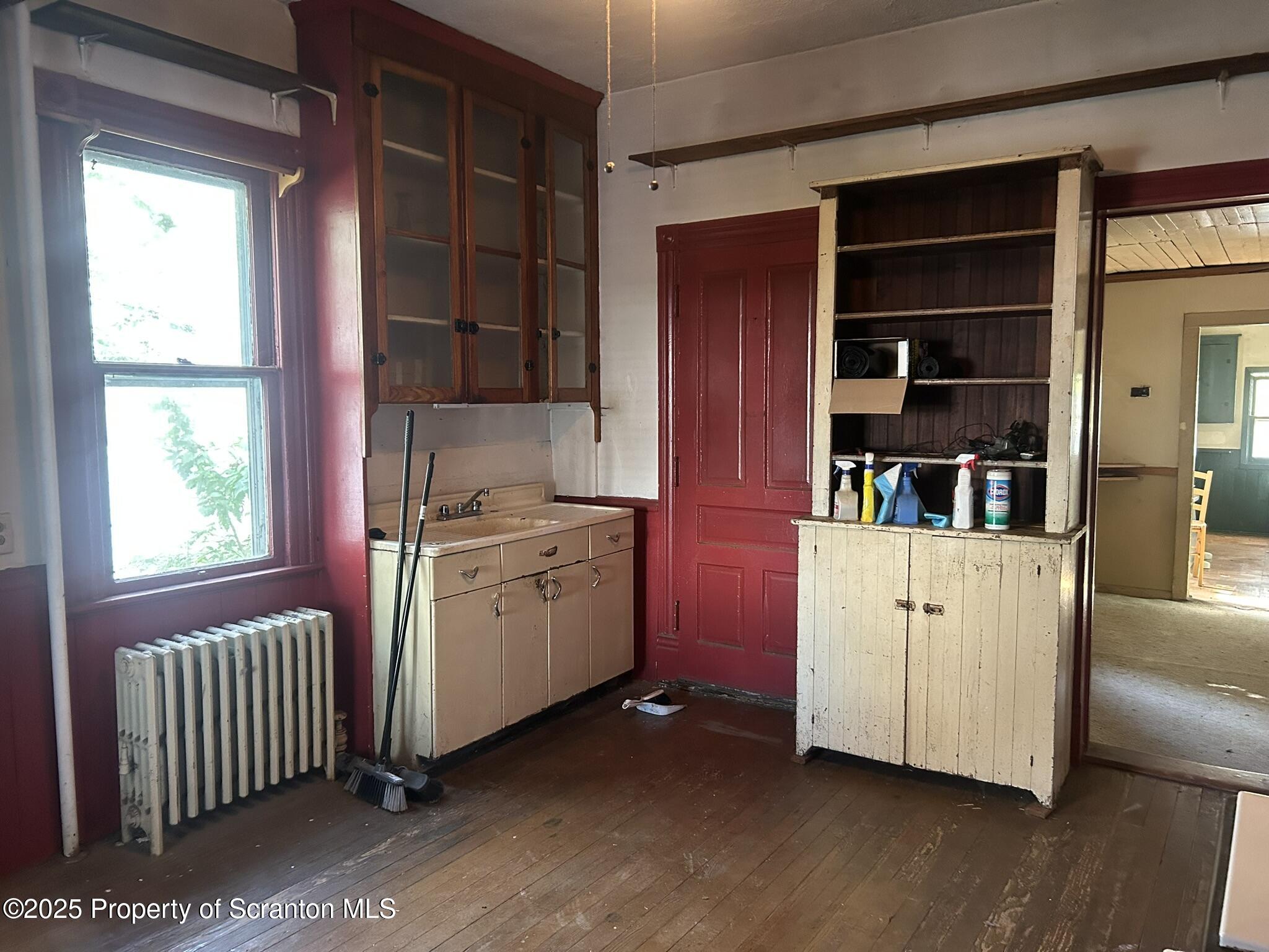 626 Cherry Street Scranton, PA 18505 - Photo 9 of 20 a room with storage and utility