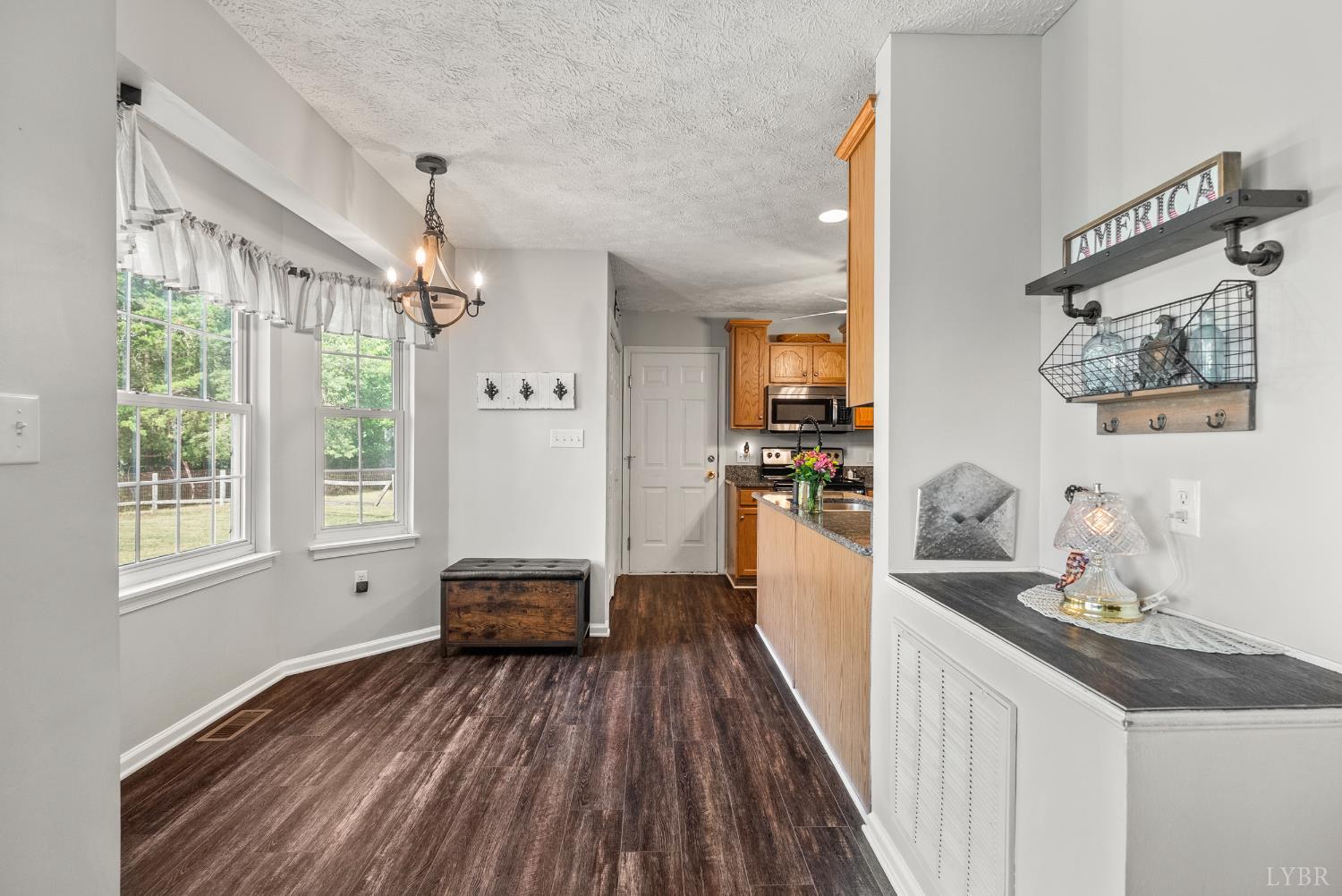 1324 Remington Ridge Drive Goode, VA 24556 - Photo 14 of 49 a kitchen with furniture and window