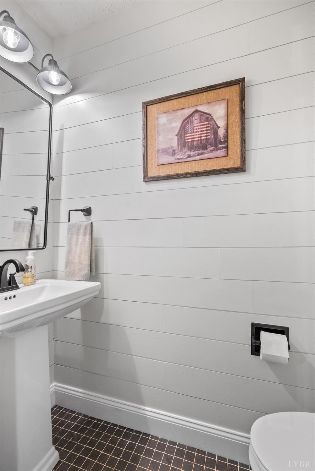 1324 Remington Ridge Drive Goode, VA 24556 - Photo 32 of 49 a bathroom with a toilet and a sink