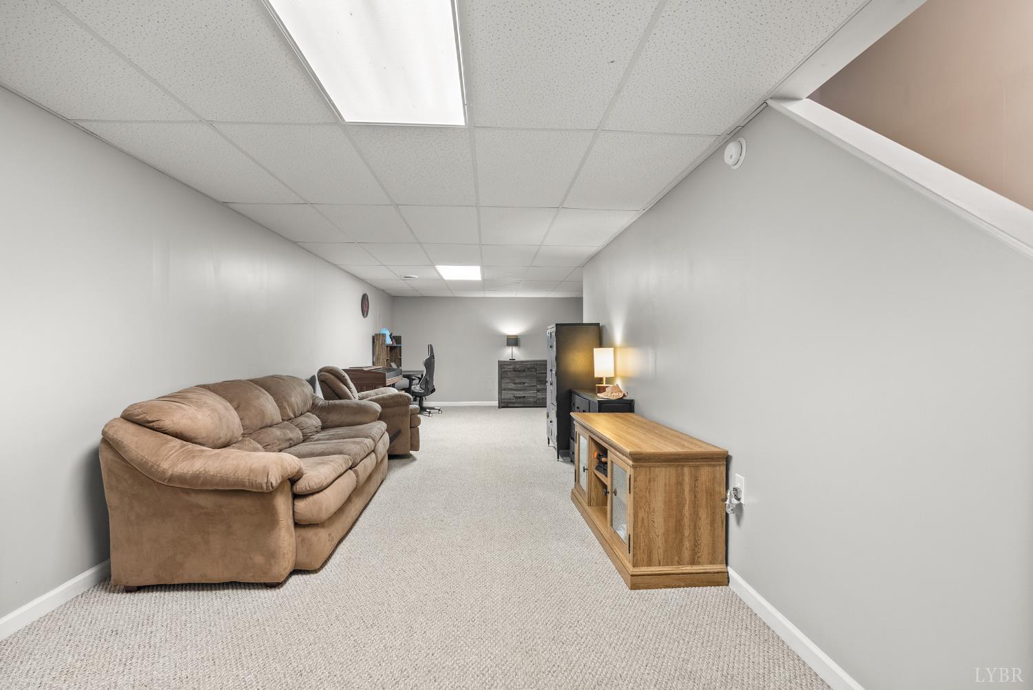 1324 Remington Ridge Drive Goode, VA 24556 - Photo 33 of 49 a living room with furniture and a couch