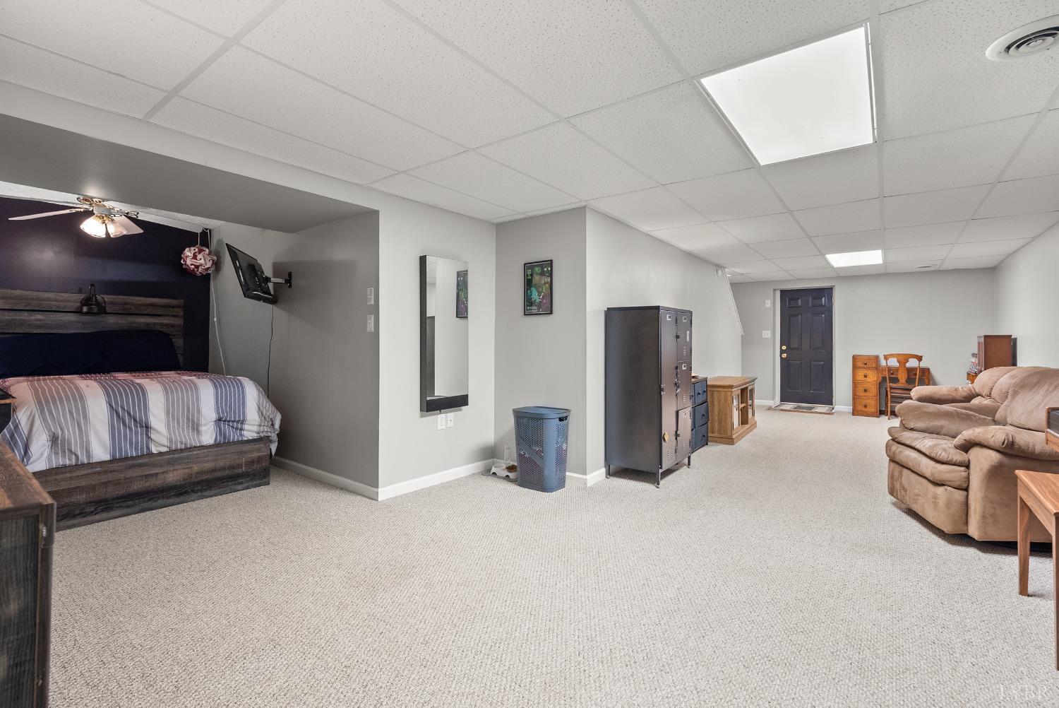 1324 Remington Ridge Drive Goode, VA 24556 - Photo 35 of 49 a room with furniture and a couch