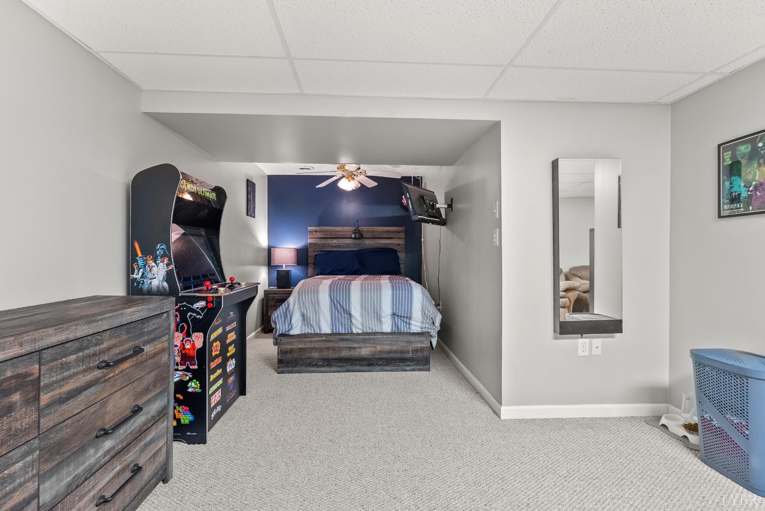 1324 Remington Ridge Drive Goode, VA 24556 - Photo 36 of 49 a bedroom with bed and a chandelier