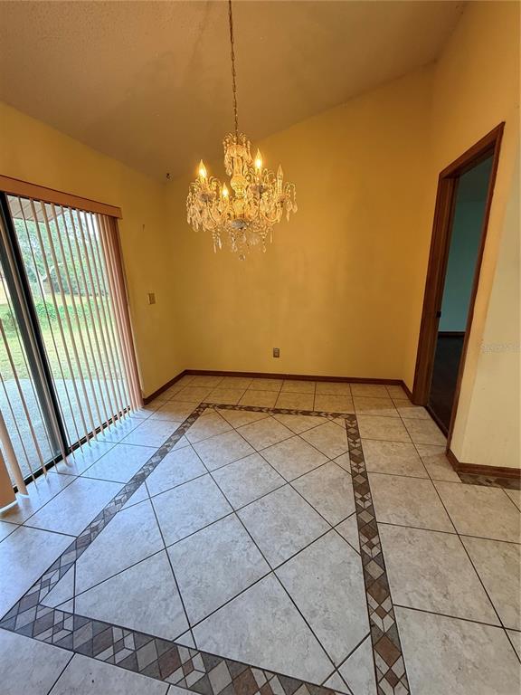 1771 Dublin Road Deltona, FL 32738 - Photo 11 of 17 a view of a livingroom with window