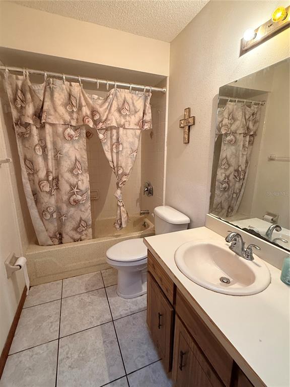 1771 Dublin Road Deltona, FL 32738 - Photo 9 of 17 a bathroom with a sink and a mirror