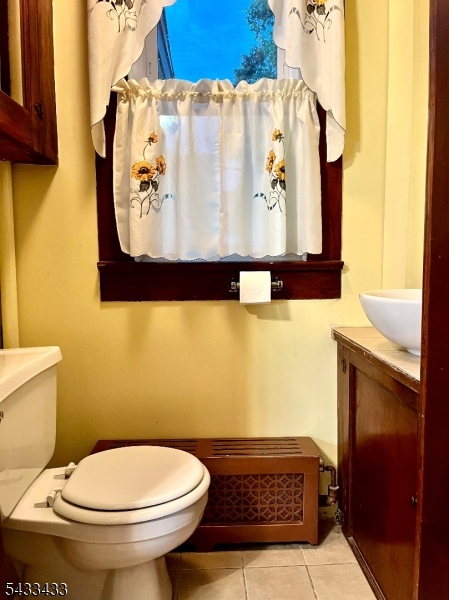 30 Fowler Street Franklin, NJ 07416 - Photo 9 of 27 a bathroom with a toilet and a sink
