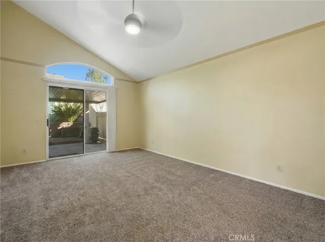 an empty room with sliding door