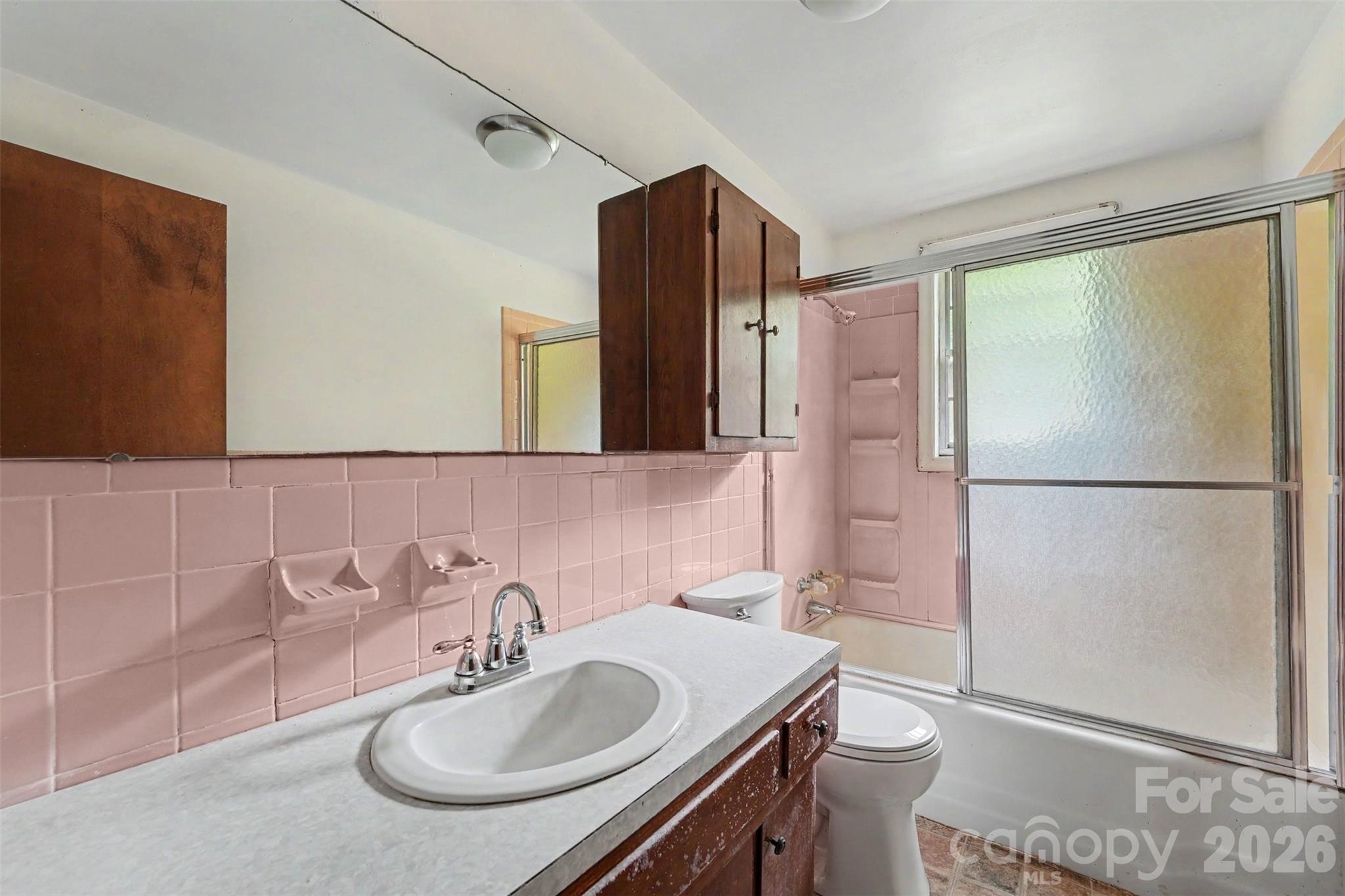 2871 Loviee Road Lincolnton, NC 28092 - Photo 10 of 14 a bathroom with a sink toilet and a mirror