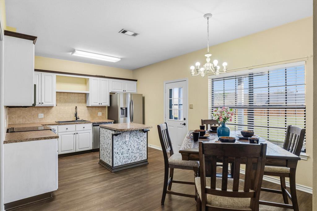 6030 Suncrest Drive Athens, TX 75752 - Photo 15 of 32 a view of a dining room with furniture and window