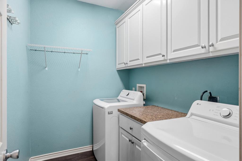 6030 Suncrest Drive Athens, TX 75752 - Photo 22 of 32 a utility room with dryer and washer