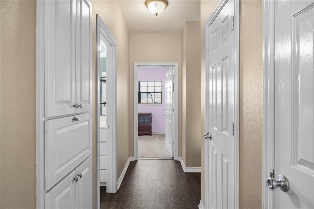 6030 Suncrest Drive Athens, TX 75752 - Photo 25 of 32 a view of a hallway with wooden floor and closet area