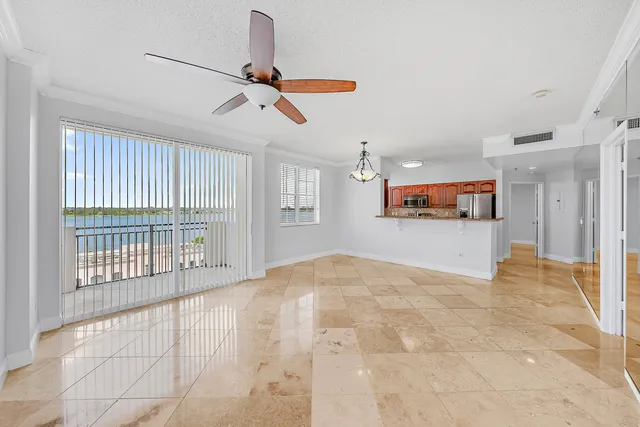 a view of a kitchen with a sink and a window