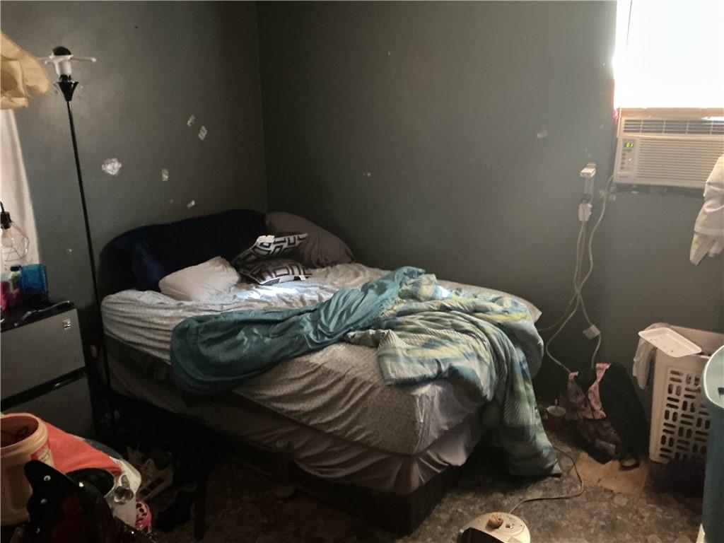 401 Old Bremen Road Temple, GA 30179 - Photo 12 of 15 a bedroom with a bed and a mirror