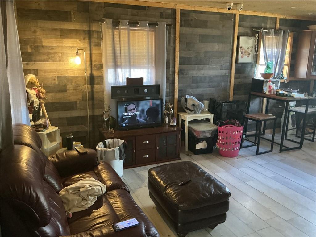 401 Old Bremen Road Temple, GA 30179 - Photo 3 of 15 a living room with furniture and a flat screen tv