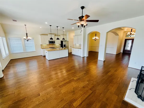 a large kitchen with stainless steel appliances kitchen island a large island in the center