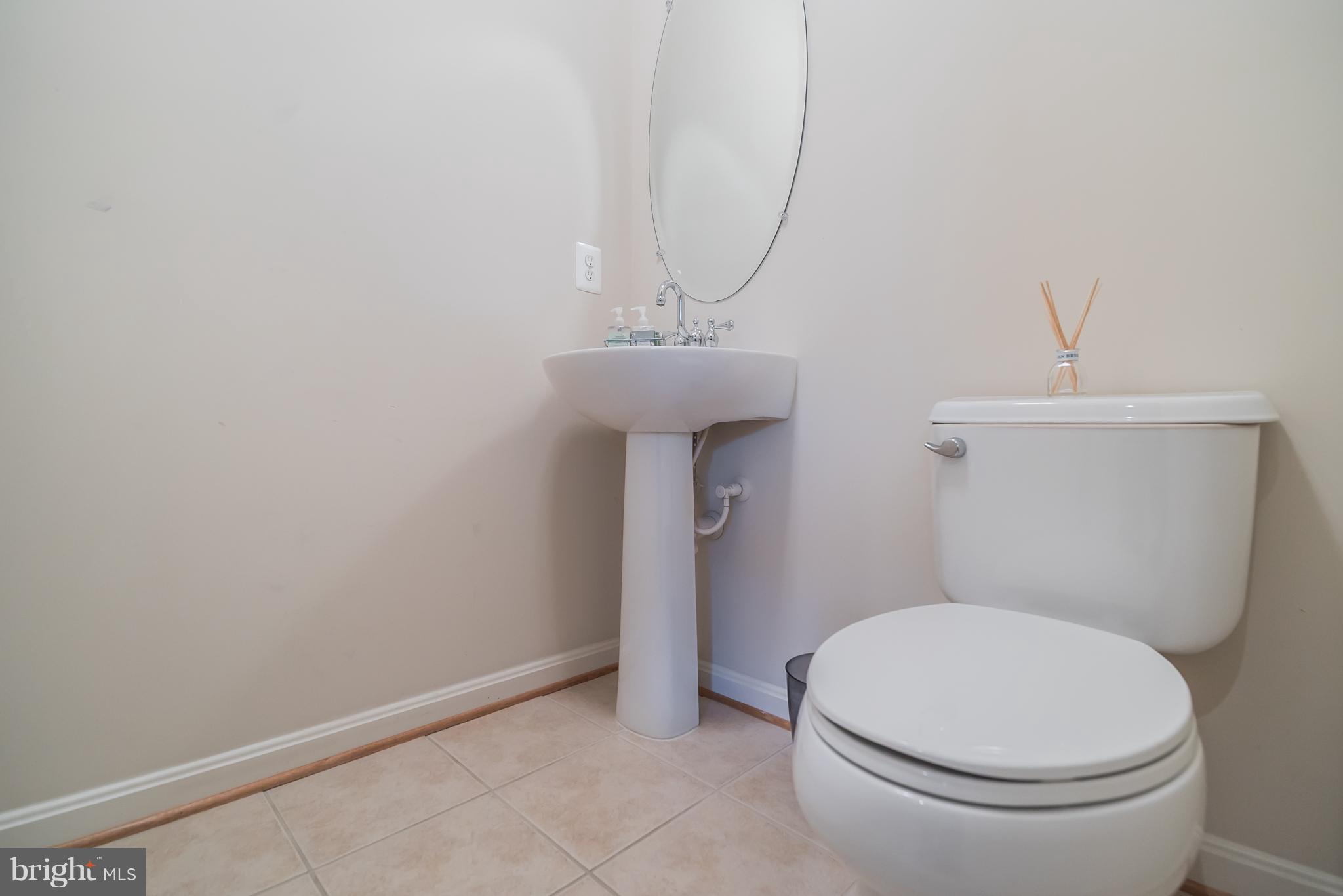 11886 Benton Lake Road Bristow, VA 20136 - Photo 6 of 27 1/2 bath on lower level