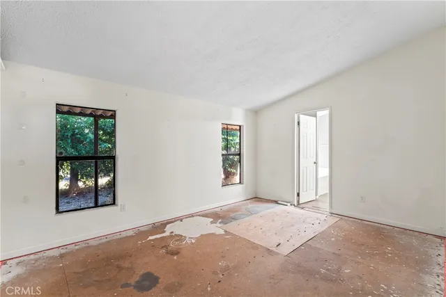 an empty room with windows