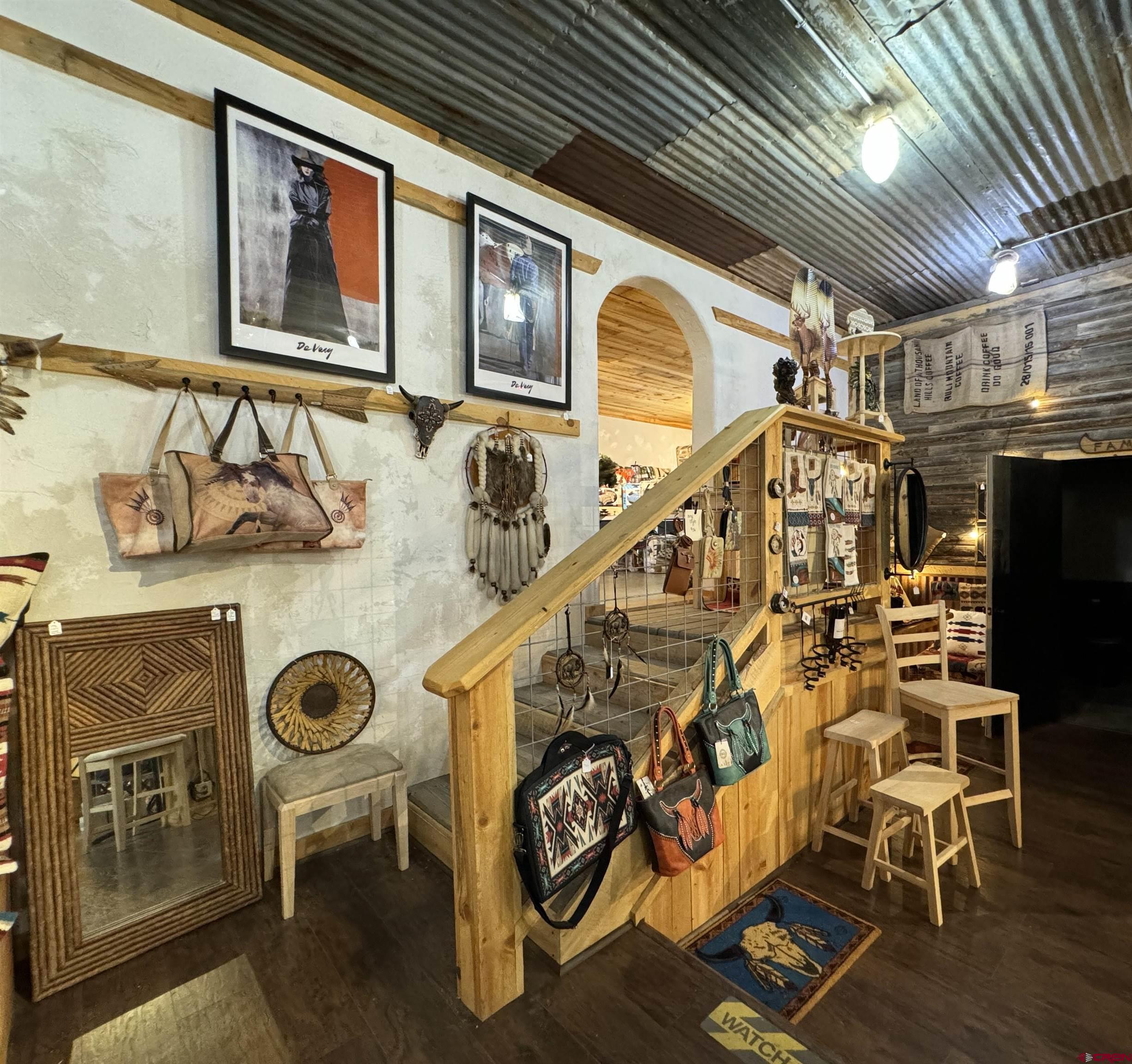 90 North Mildred Road Cortez, CO 81321 - Photo 18 of 26 a view of entryway with furniture and wooden floor