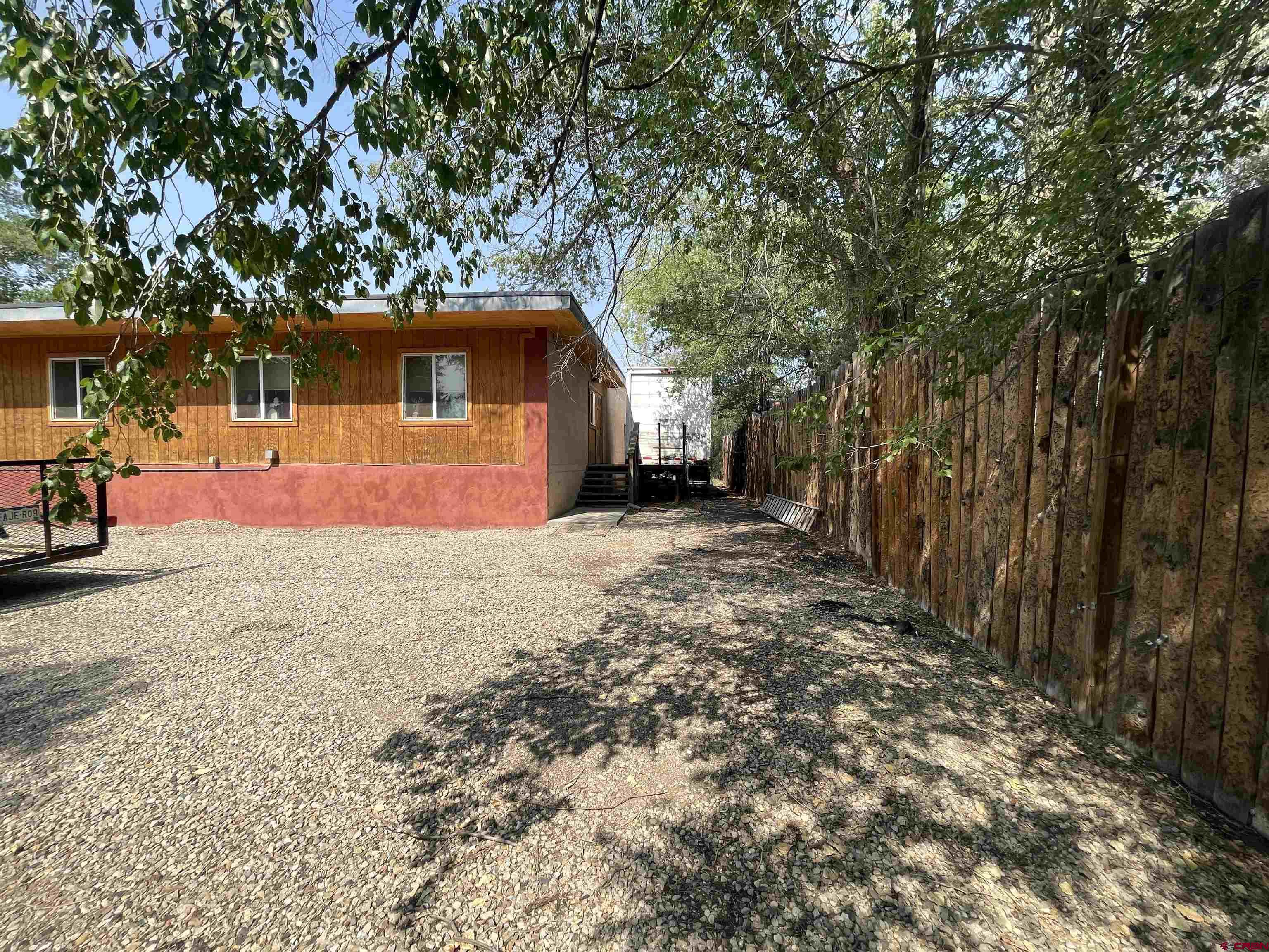 90 North Mildred Road Cortez, CO 81321 - Photo 10 of 26 a front view of a house with a yard