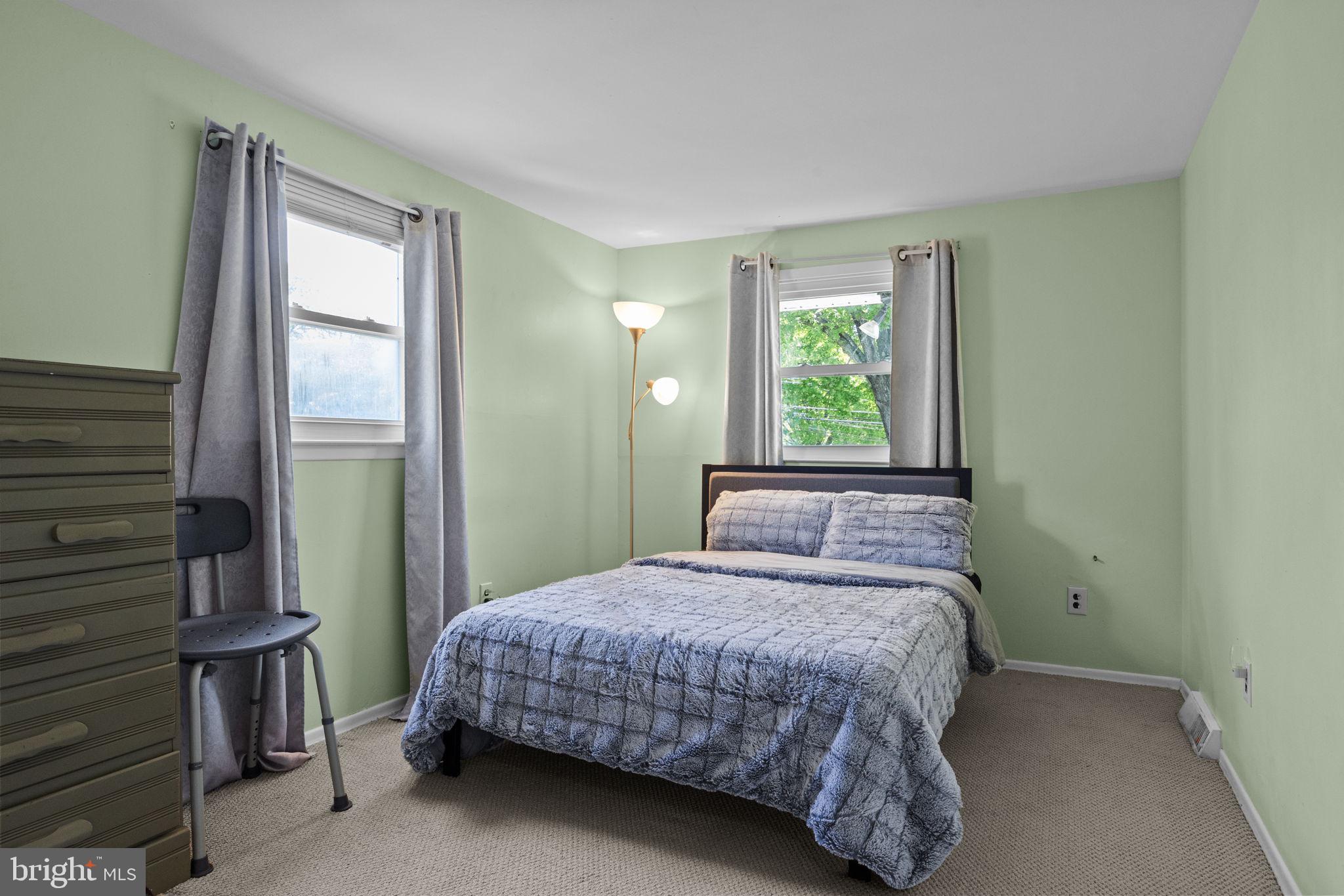 238 Centennial Road Warminster, PA 18974 - Photo 24 of 34 a bedroom with a bed and a window