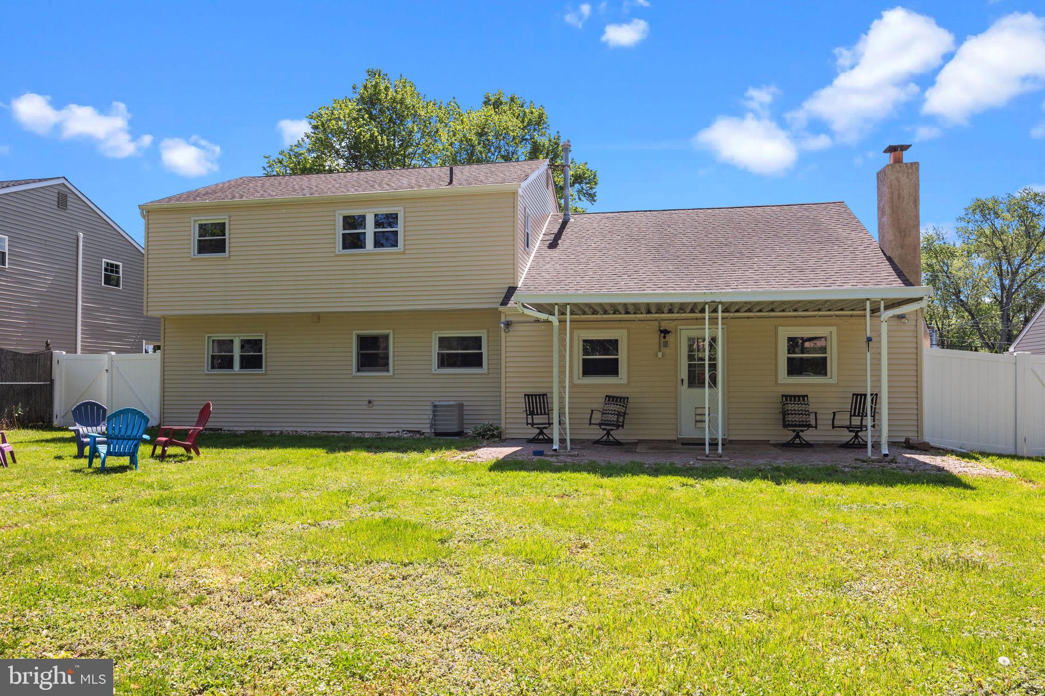 238 Centennial Road Warminster, PA 18974 - Photo 31 of 34 a view of a house with swimming pool and sitting area