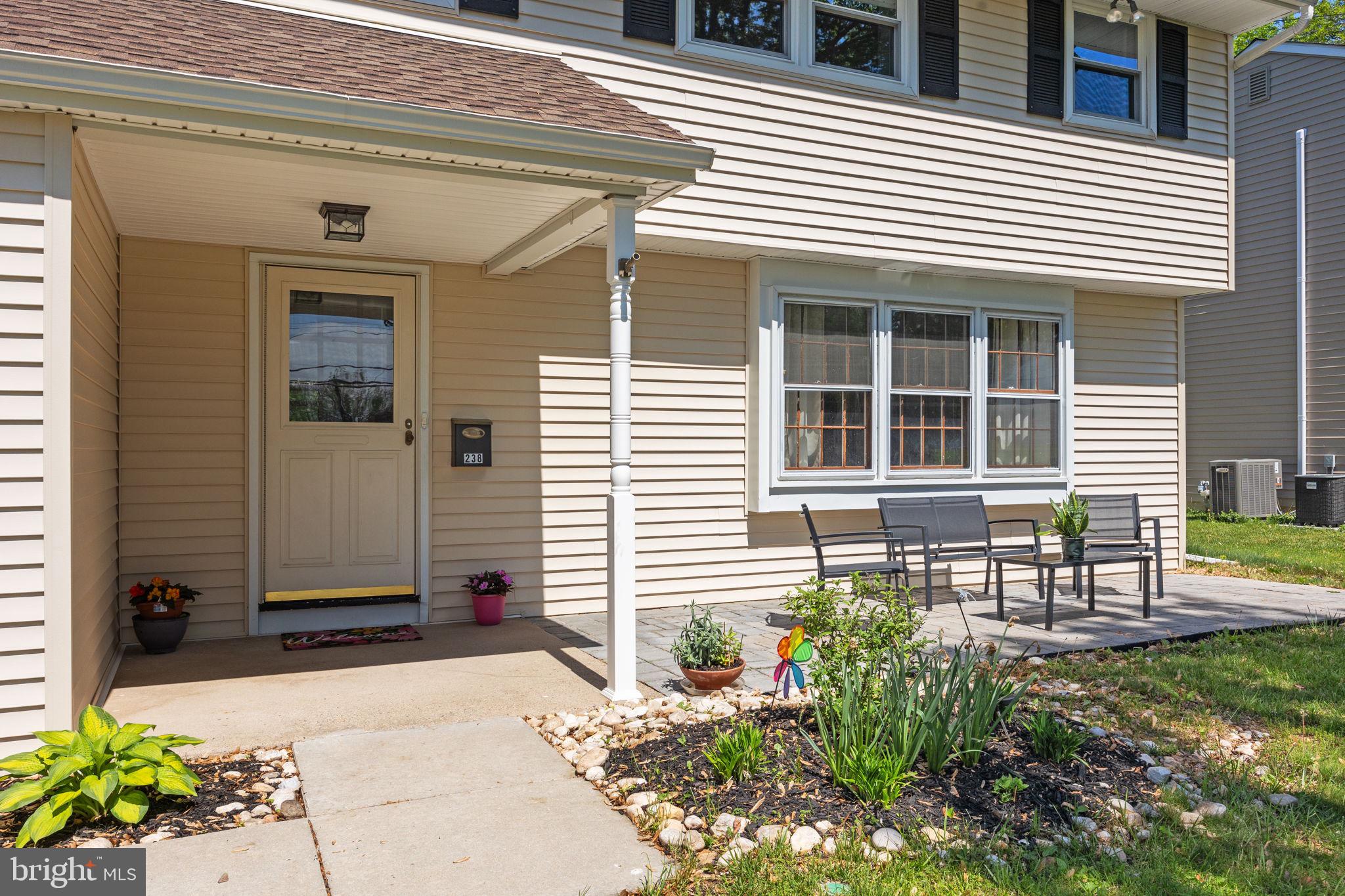 238 Centennial Road Warminster, PA 18974 - Photo 33 of 34 a front view of a house with a porch