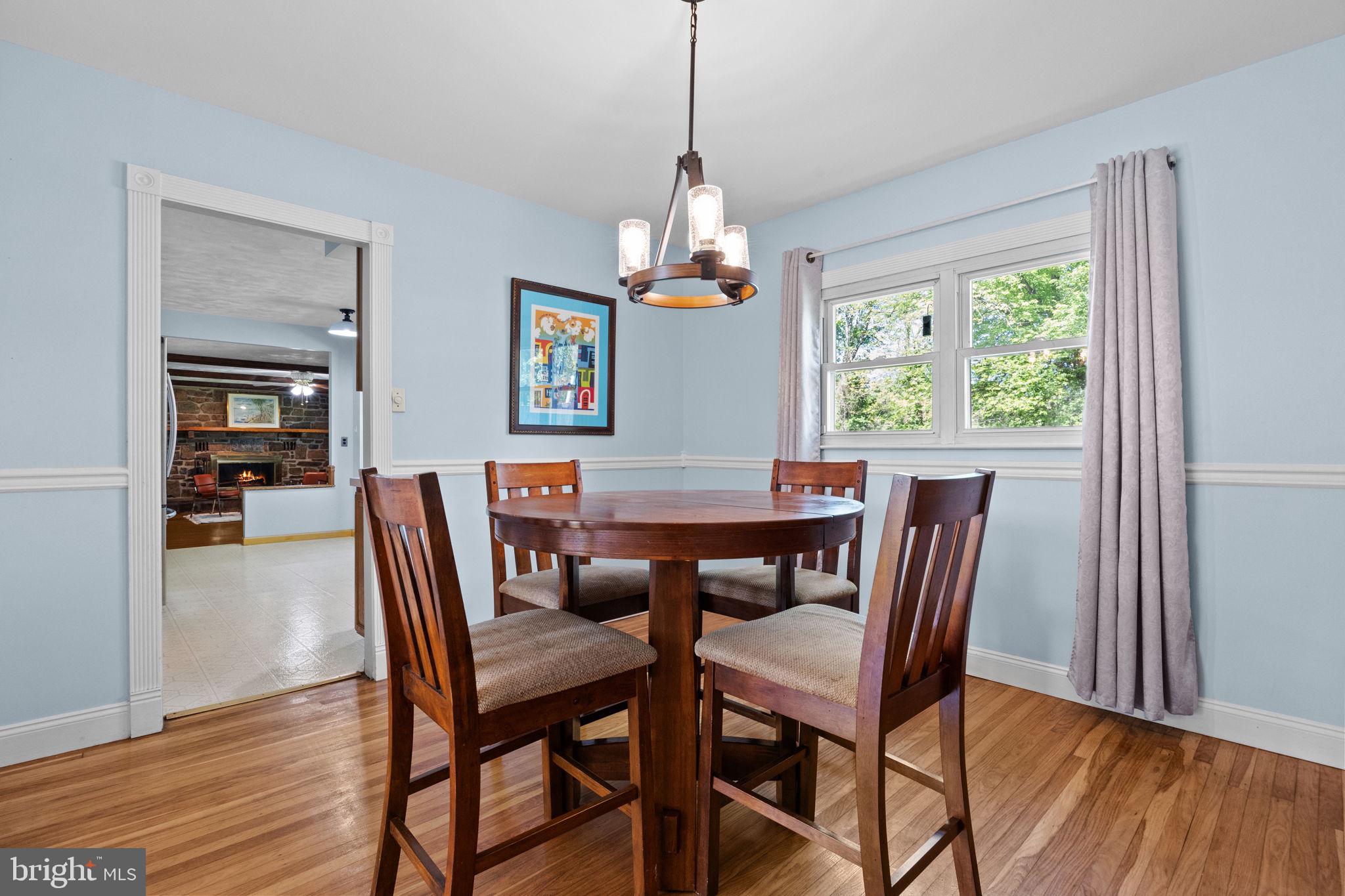 238 Centennial Road Warminster, PA 18974 - Photo 4 of 34 a view of a dining room with furniture window and wooden floor