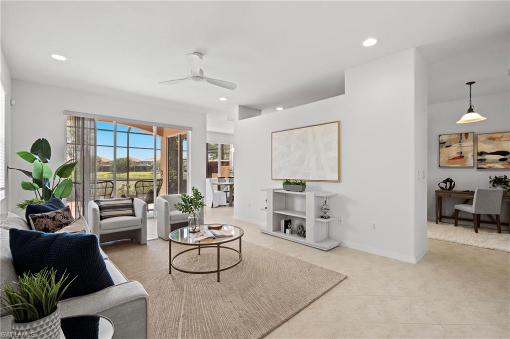 20467 Larino Loop Estero, FL 33928 - Photo 4 of 45 a living room with furniture and a window