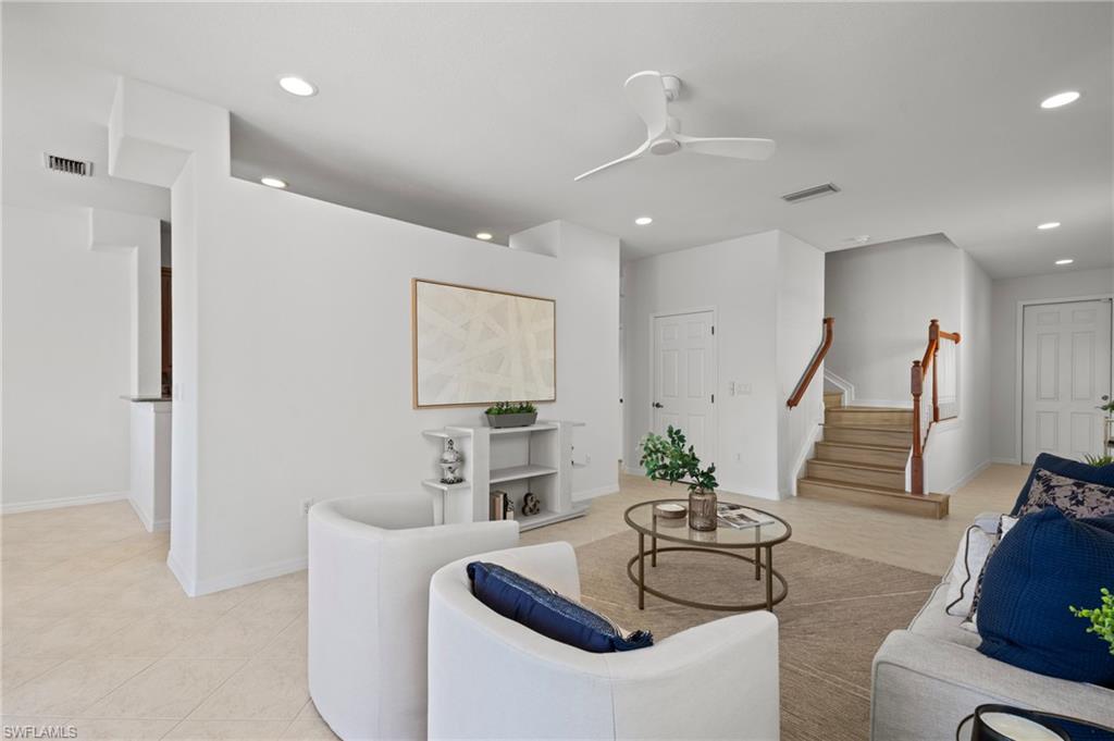 20467 Larino Loop Estero, FL 33928 - Photo 7 of 45 a living room with furniture and a potted plant