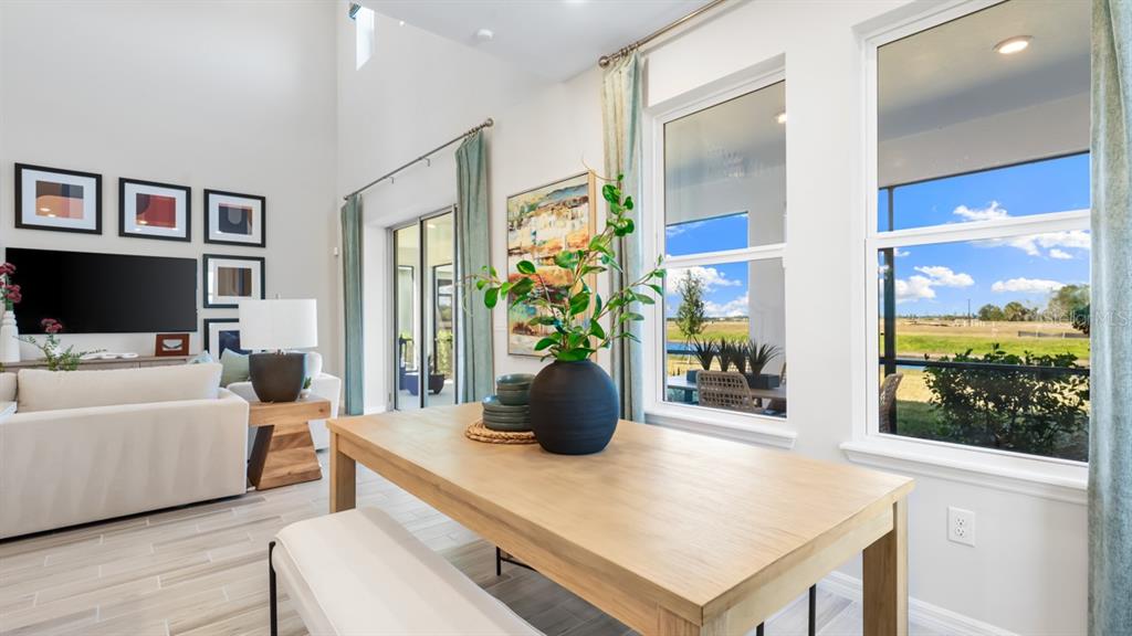 13333 Stable Place Parrish, FL 34219 - Photo 24 of 33 a living room with furniture and a flat screen tv