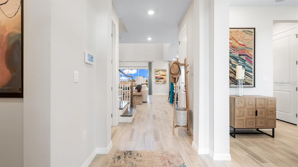 13333 Stable Place Parrish, FL 34219 - Photo 5 of 33 a view of livingroom with furniture and wooden floor