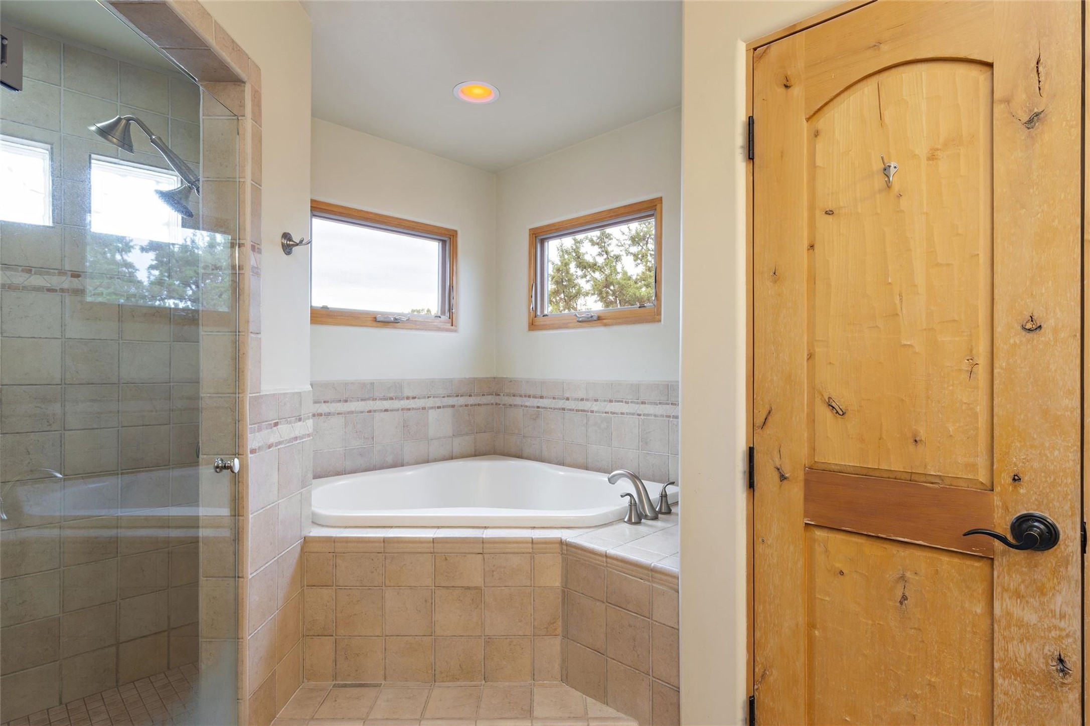 5 Rico Court Santa Fe, NM 87508 - Photo 16 of 32 Primary bathroom tub and shower