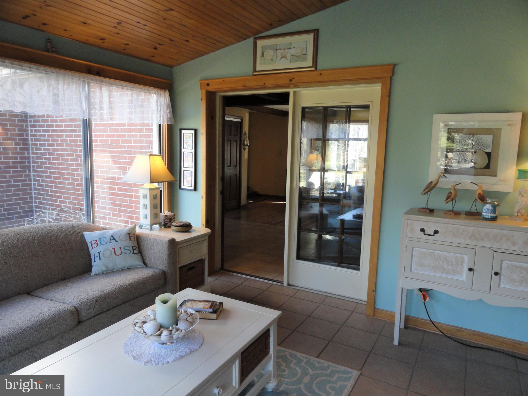 793 Henning Road Perkiomenville, PA 18074 - Photo 28 of 67 Sun room looking back to living room