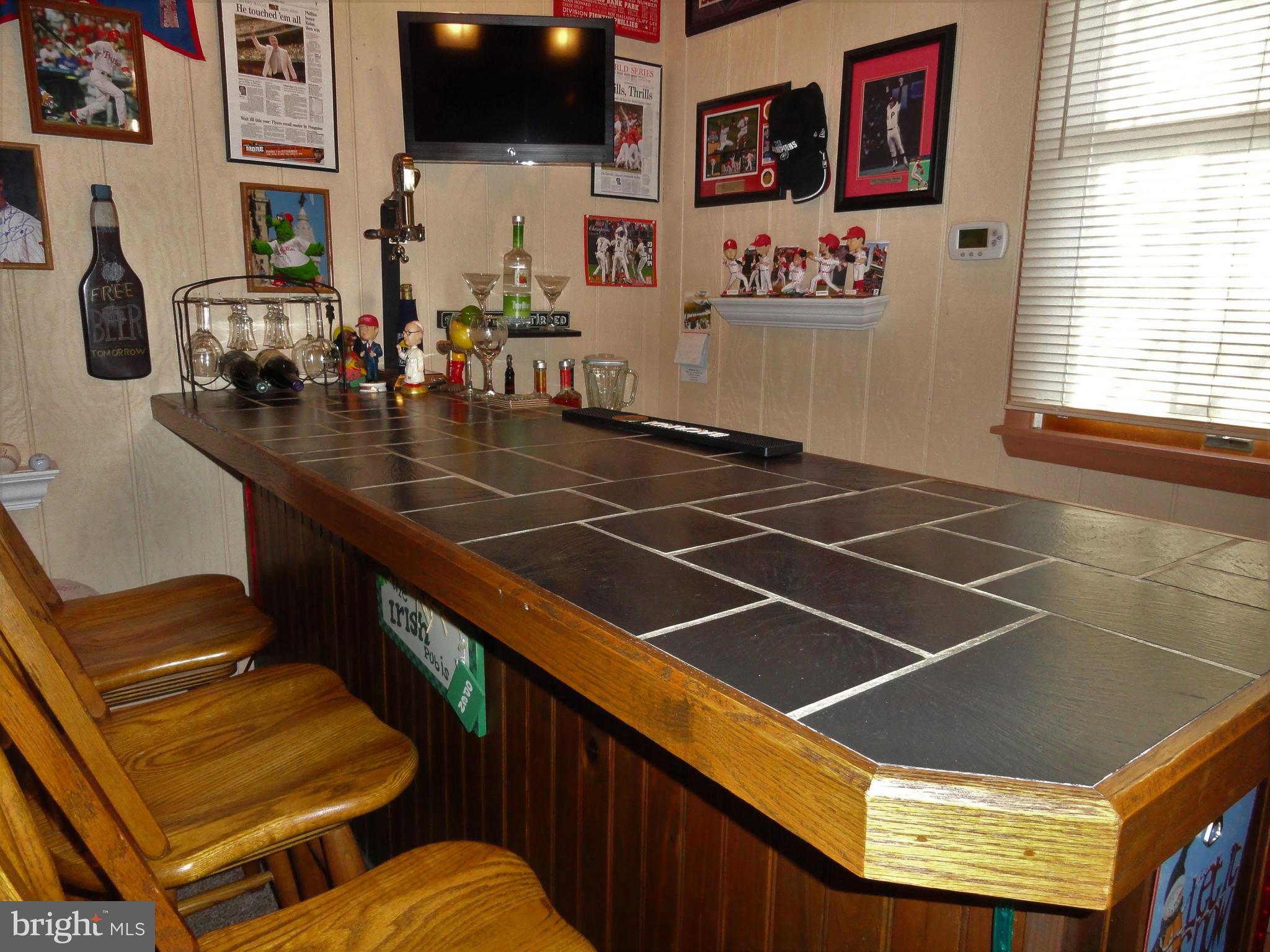 793 Henning Road Perkiomenville, PA 18074 - Photo 33 of 67 Family room bar with custom top.