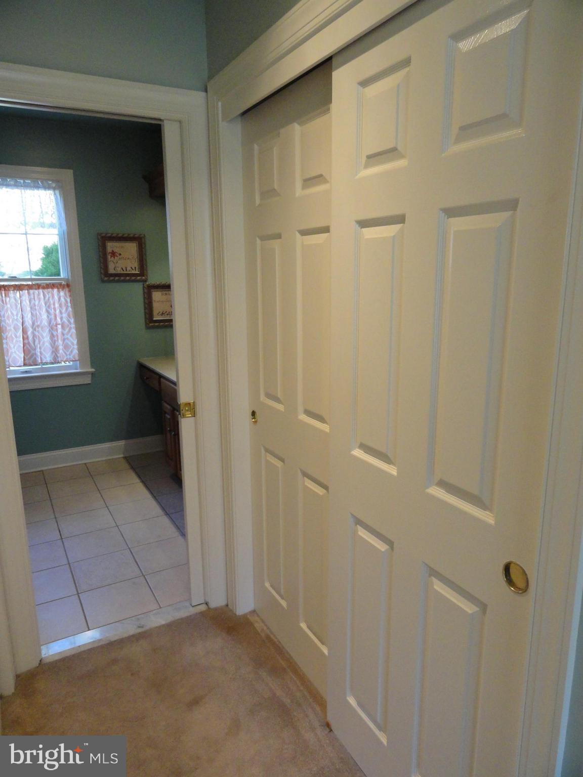 793 Henning Road Perkiomenville, PA 18074 - Photo 39 of 67 Main br closets on each side of hallway to bath
